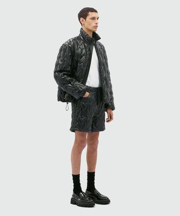 Black quilted "TheMwave" pattern shorts