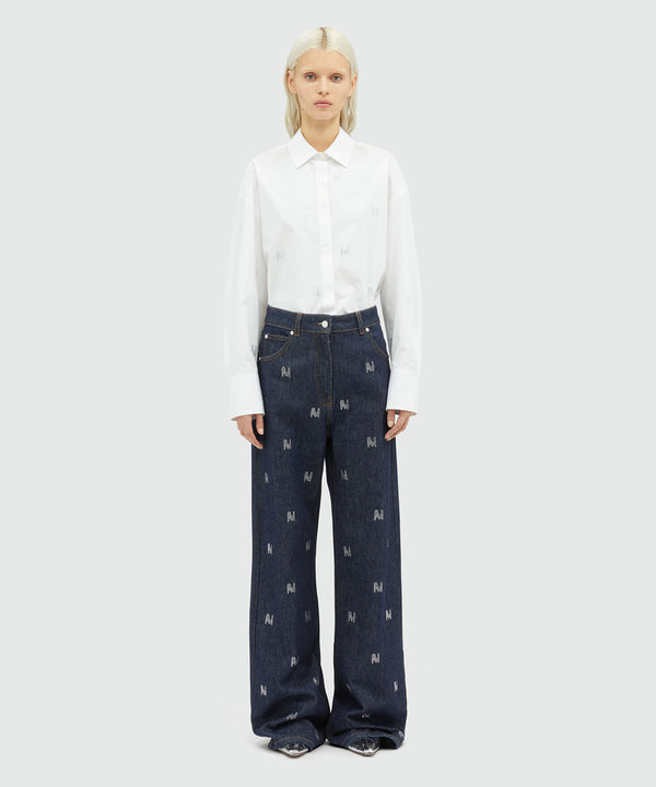 Wide-leg denim pants with  "TheMwave" motif