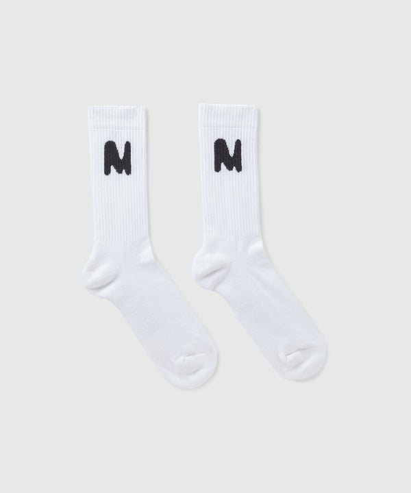 White socks with "TheMwave" jacquard graphic