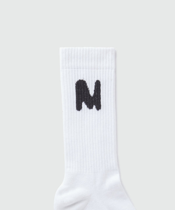 White socks with "TheMwave" jacquard graphic