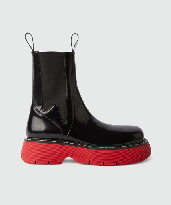 Black leather MSGM Chelsea boots with red sole