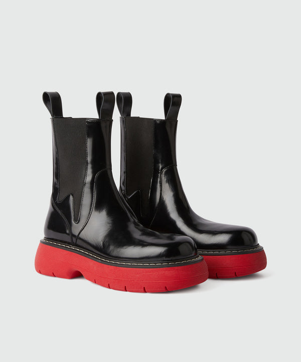 Black leather MSGM Chelsea boots with red sole