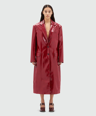 Red patent leather coat with structured shoulders