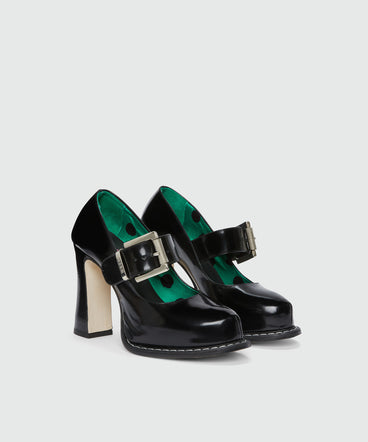 Black patent leather Mary Janes with platform