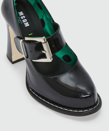 Black patent leather Mary Janes with platform