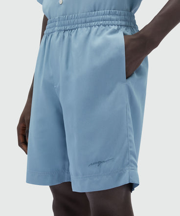 Bermuda shorts in powder blue fluid viscose