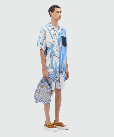 Bermuda shorts in light blue poplin with "Sale race" print