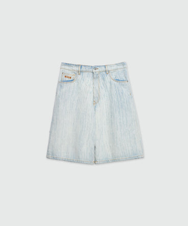 Bermuda shorts in light denim with a destroyed effect