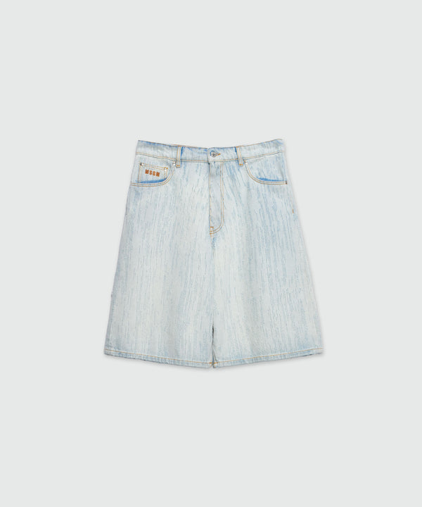 Bermuda shorts in light denim with a destroyed effect