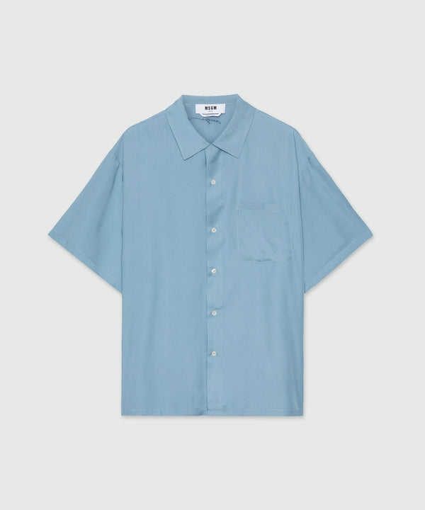 Shirt in powder blue fluid fabric