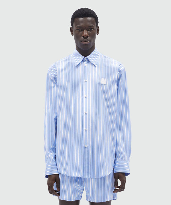 Shirt in light blue poplin with stripes and "TheMwave" embroidery