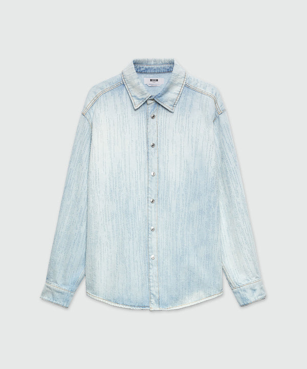 Light denim shirt with destroyed effect