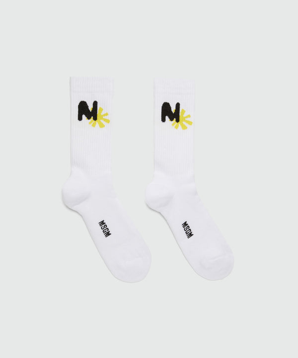 White socks with "TheMwave" jacquard graphics