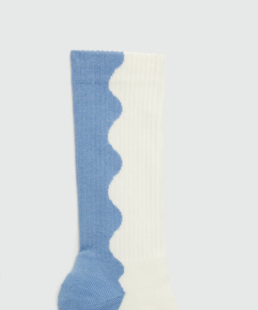 White and light blue socks with wave pattern