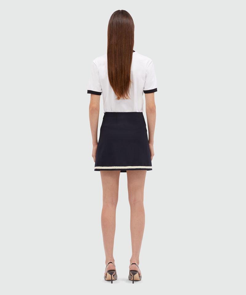 Short skirt in fresco wool with bouclé profiles 88 Women 