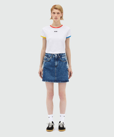 Short denim skirt with metal buttons