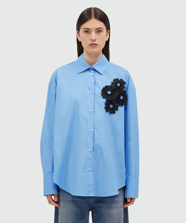 Light blue poplin shirt with floral applications