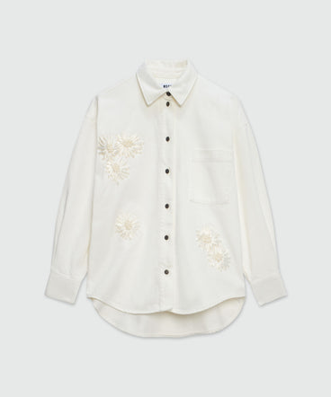 White denim shirt with raffia flowers