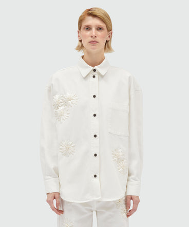 White denim shirt with raffia flowers