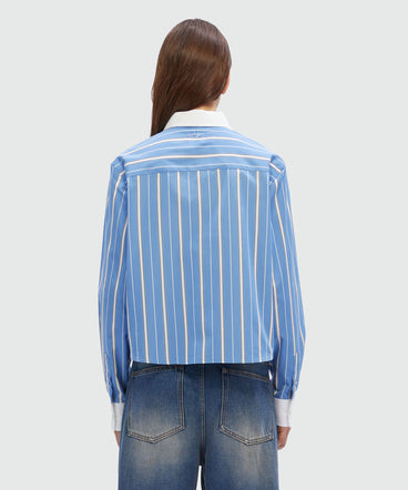 Striped light blue poplin shirt with sun detail