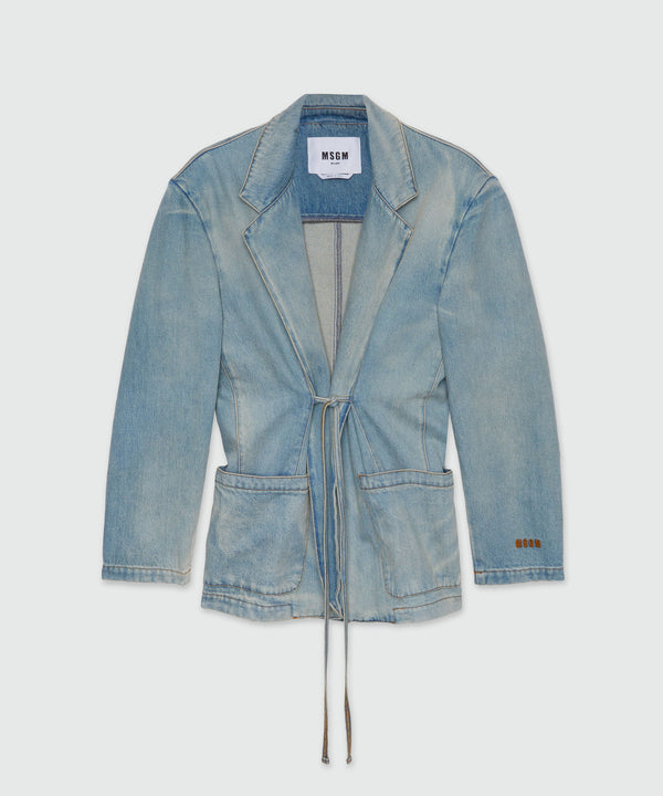 Faded denim jacket with shoulder pads