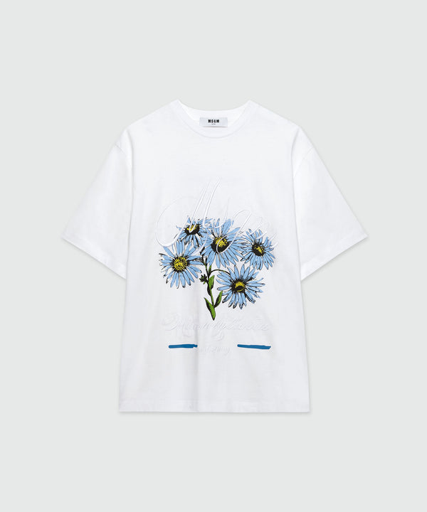 T-Shirt in cotone bianco con ricami e grafica fiori