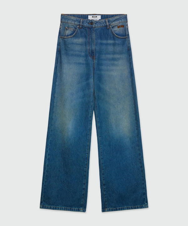 Pantalone a gamba ampia in denim slavato blu