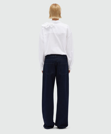 Indigo raw denim trousers with embroidery