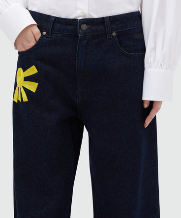 Indigo raw denim trousers with embroidery