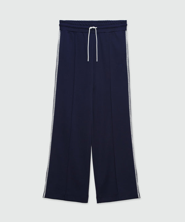 Pantalone jogger blu con ricamo à jour