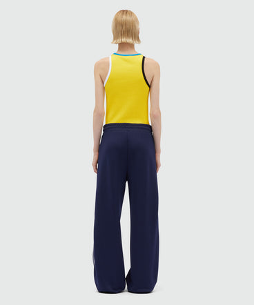 Blue jogger trousers with embroidery à jour