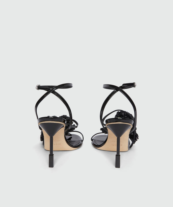 Black patent leather sandals with raffia detail and iconic MSGM heel