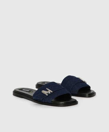 Flat sandals in indigo denim with "TheMwave" detail