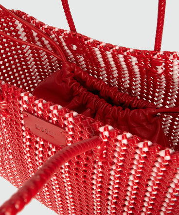 Woven tote bag with red nappa clutch bag