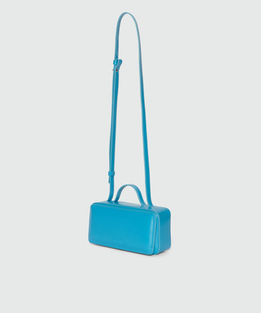 Small light blue shiny leather CLAP BAG