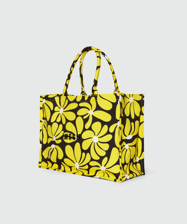 Borsa tote in canvas nero e motivo fiori gialli