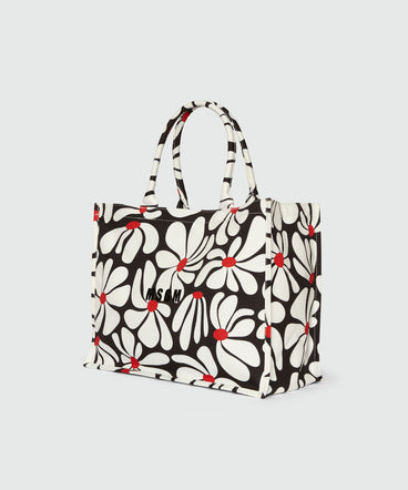 Borsa tote in canvas nero e motivo fiori bianchi