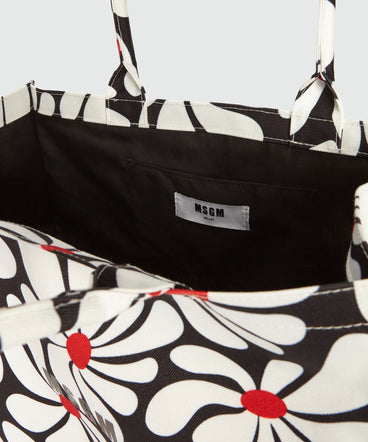 Tote bag in black canvas and white flower motif